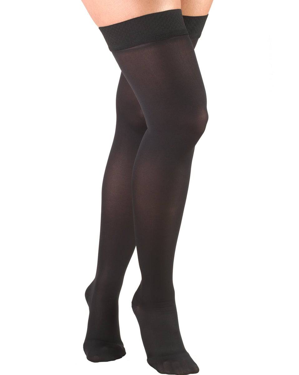Black knee-high socks on a white background