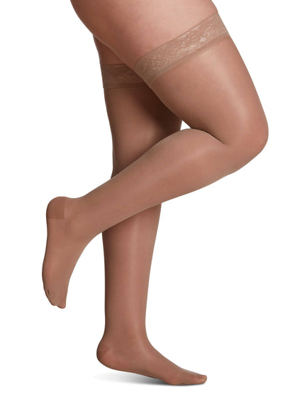 Golden knee-high socks with navy tops on a white background