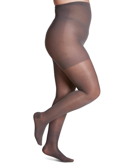 Brown sheer tights worn by a model on a white background