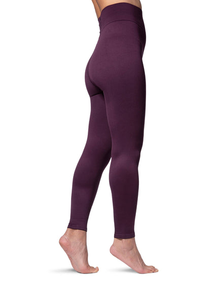 LIght Red leggings worn by a person on a white background