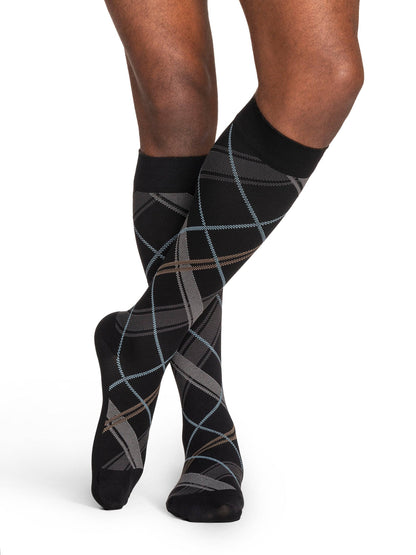 Black and gray striped knee-high socks on a white background
