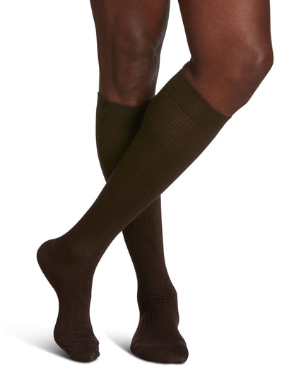 Khakri knee-high socks worn by a person on a white background