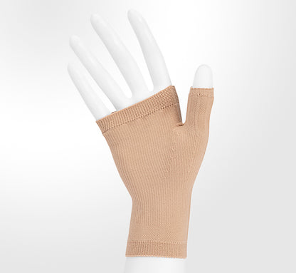 Beige fingerless glove on a white background. Explore the Juzo Compressionsale collection of compression accessories designed for comfort, support, and everyday wear