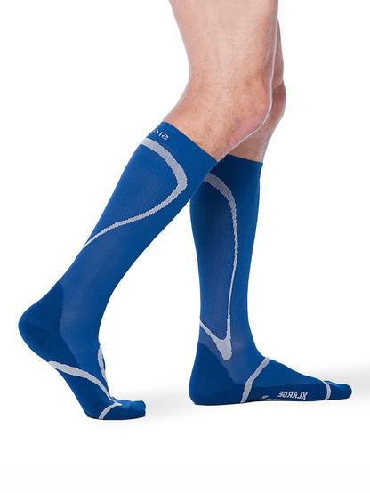Blue compression socks with gray accents on a white background