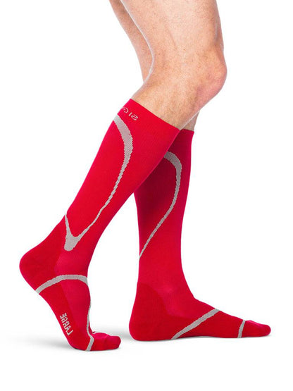 Red compression socks with gray accents on a white background