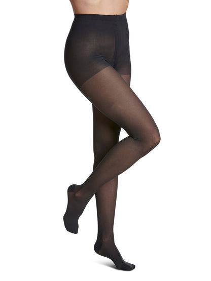 NIghtshade sheer tights worn by a model on a white background