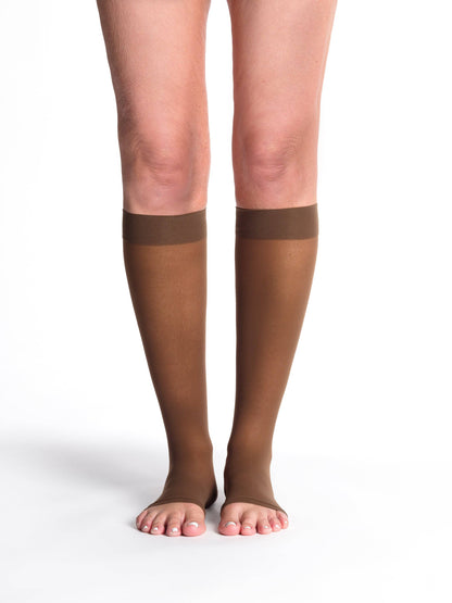 Mocha knee-high socks with navy tops on a white background