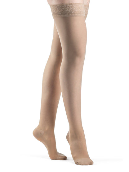 Honey sheer stockings with lace top on a white background