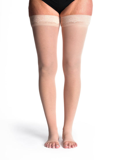 Warm Sand sheer stockings with lace top on a white background