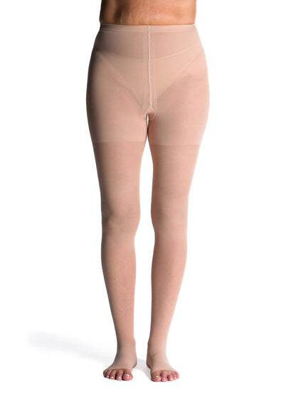 Warm Sand sheer stockings worn by a model on a white background