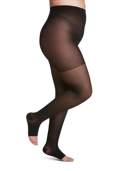 Navy sheer stockings worn by a model on a white background