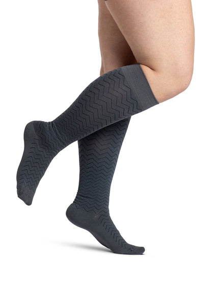 Light Gray striped socks worn by a person on a white background