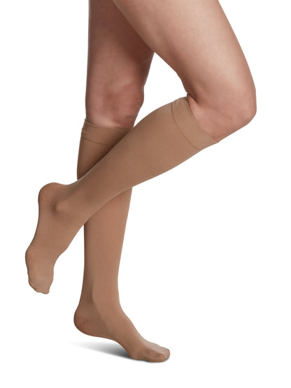 Chai knee-high socks worn by a person on a white background