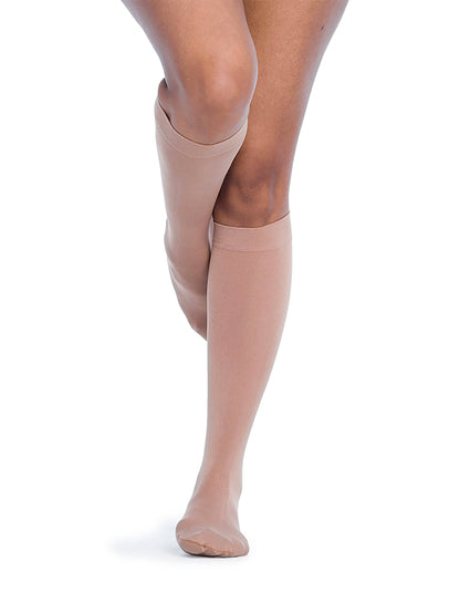 Pecan knee-high socks worn by a person on a white background