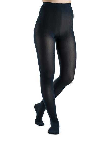 Blue tights worn by a person on a white background