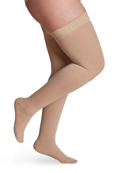 Honey sheer stockings with lace top on a white background