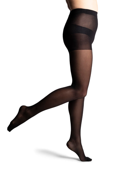 Black sheer stockings worn by a person on a white background