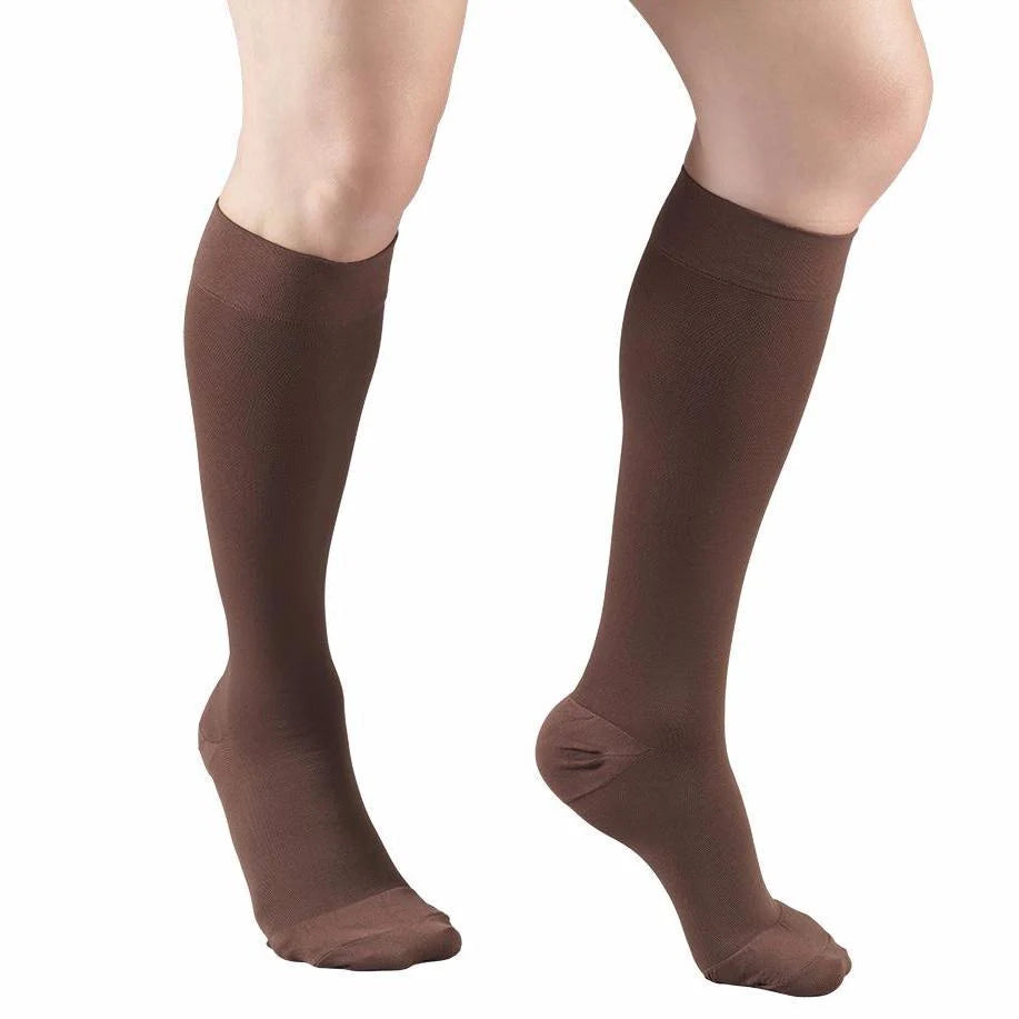 Brown knee-high socks worn by a person on a white background in Truform from compressionsale