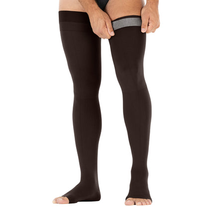Person wearing black compression stockings from Compressionsale on a white background.