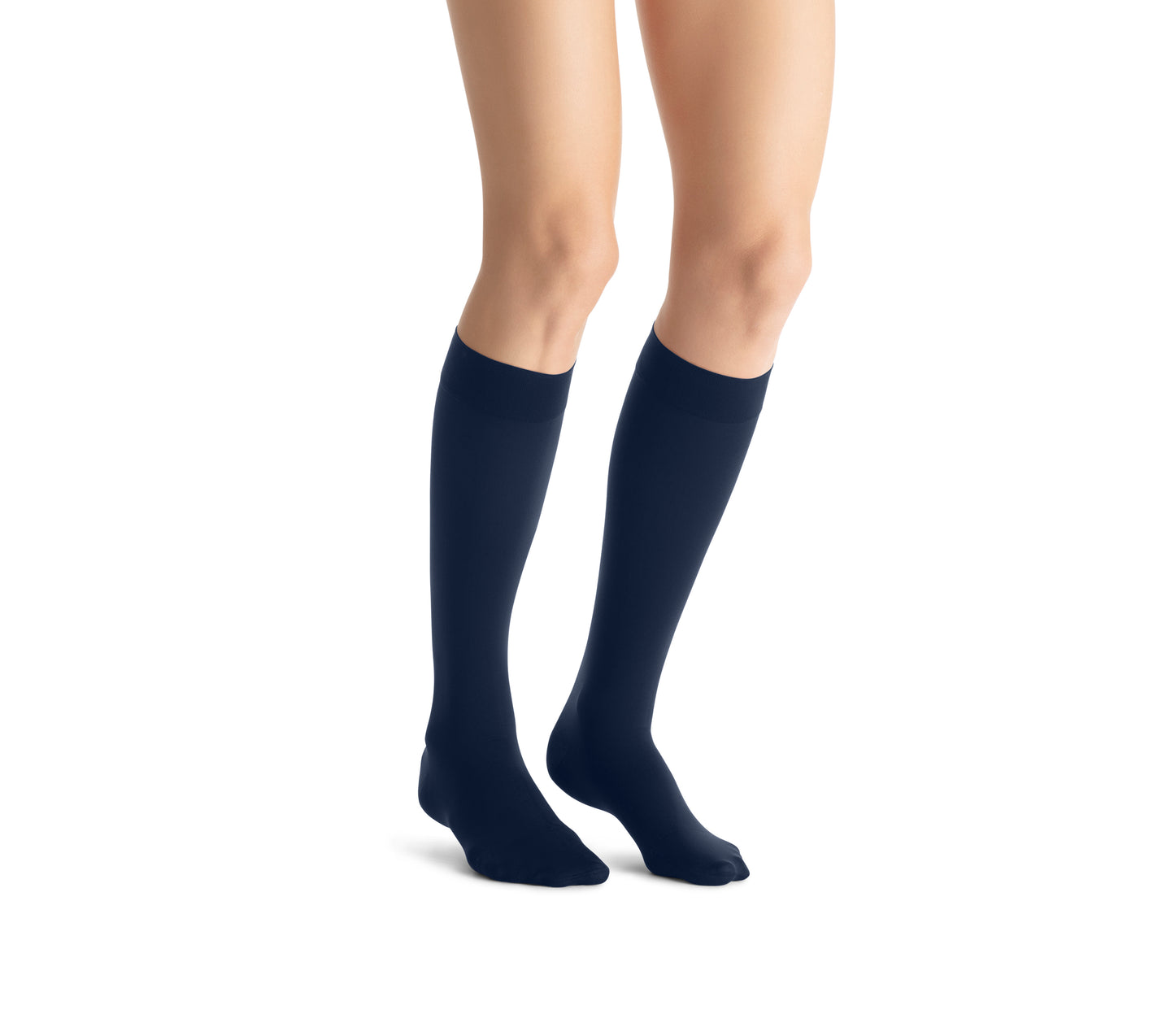 Navy knee-high socks worn by a person on a white background