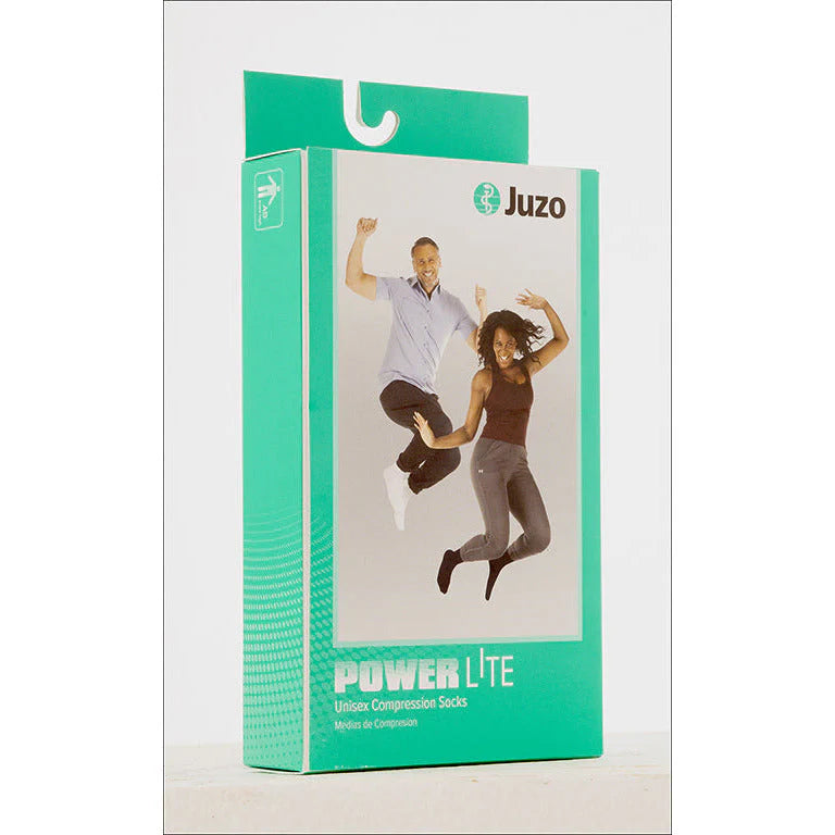 Juzo Power Lite compression socks packaging showing active lifestyle models on a white background – Compressionsale
