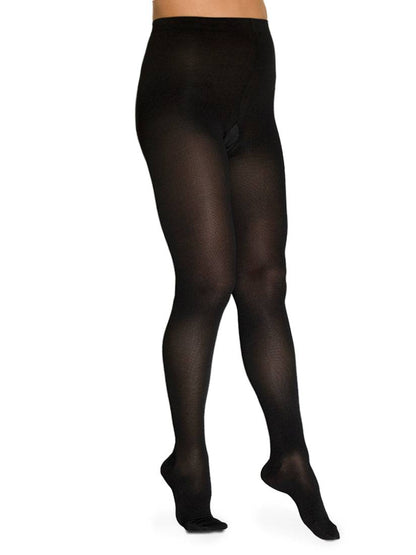 Black tights worn by a model on a white background