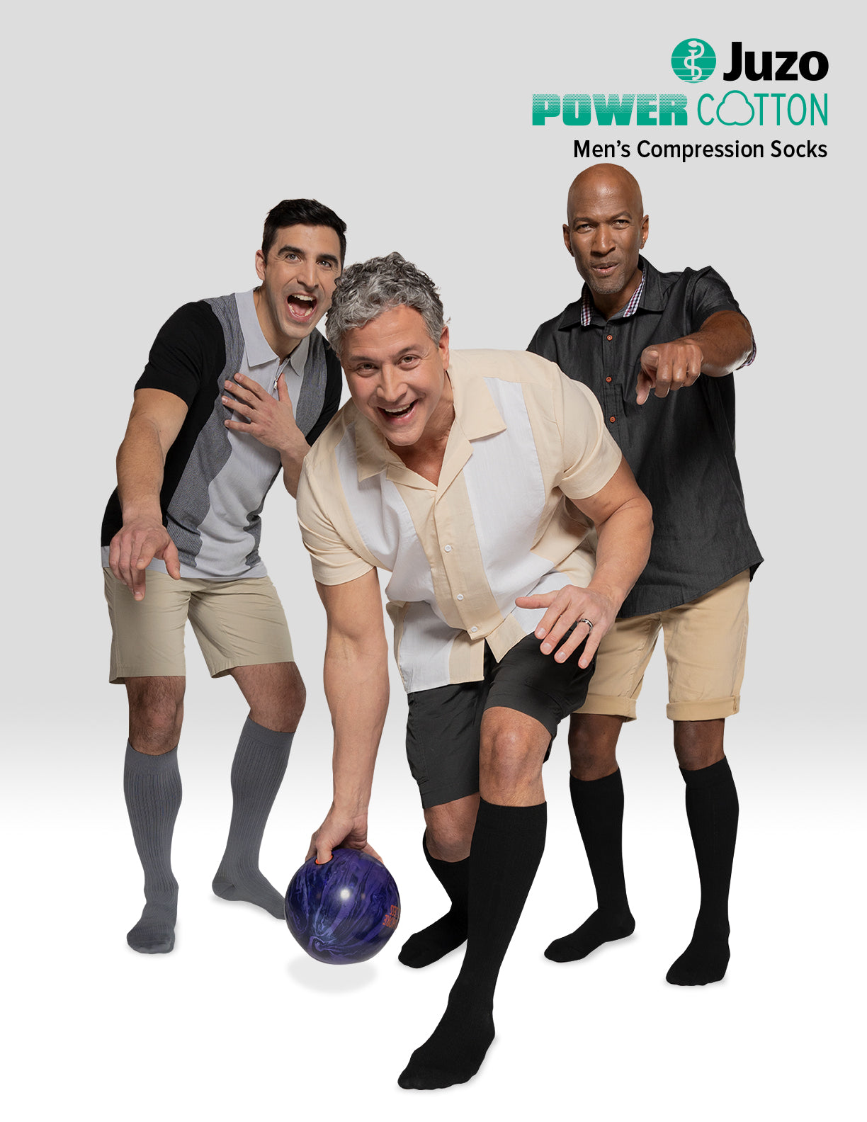 Three men posing with a bowling ball, promoting Juzo Power Cotton men's compression socks – Compressionsale compression wear for comfort and leg support.