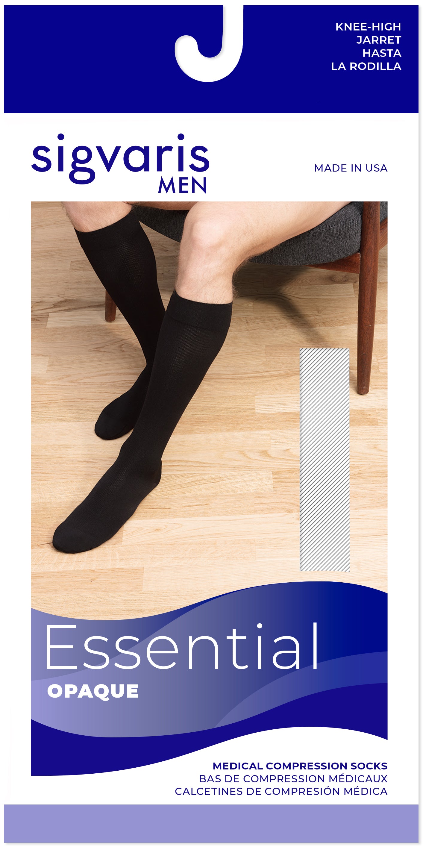 Sigvaris Men's Essential Opaque compression socks packaging on a wooden floor background