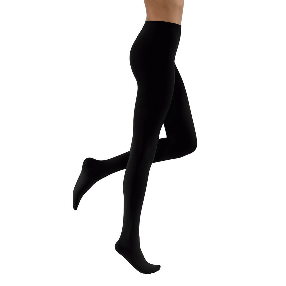 Black tights worn by a person on a white background