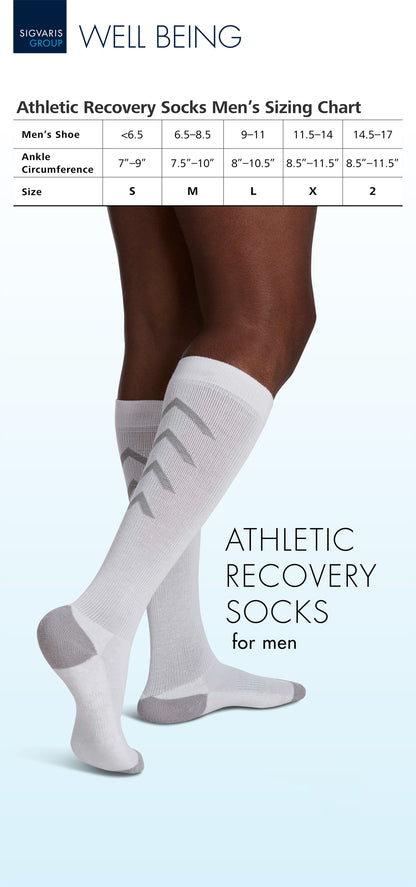 Athletic recovery socks with sizing chart for men on a light blue background