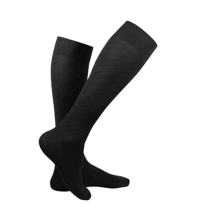 Pair of black knee-high socks on a white background