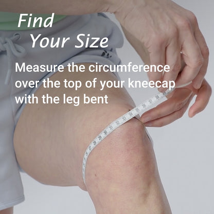 Person measuring the circumference over the top of a kneecap with a measuring tape.