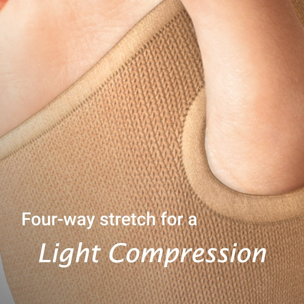 Close-up of beige compression garment with text 'Four-way stretch for a Light Compression