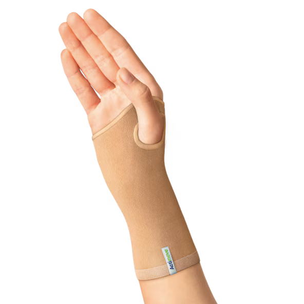 Hand wearing a beige wrist support brace on a transparent background