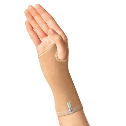 Hand wearing a beige wrist support brace on a transparent background