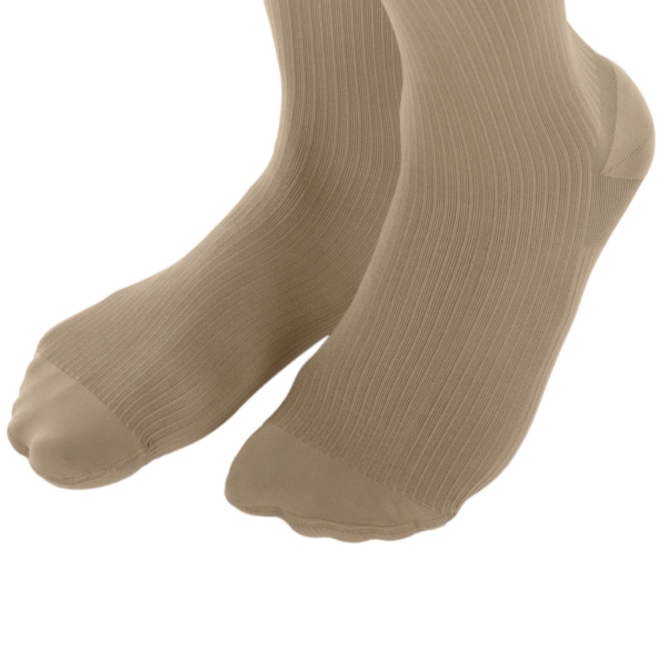 Pair of beige socks on a white background