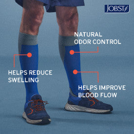 Blue compression socks with text highlighting benefits on a blue background, featuring the JOBST brand.