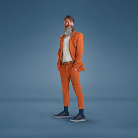Man wearing an orange suit standing against a blue background
