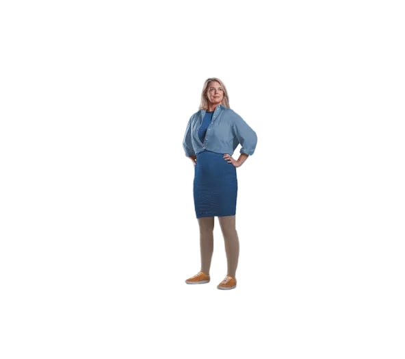 Woman wearing a blue outfit standing against a gray background