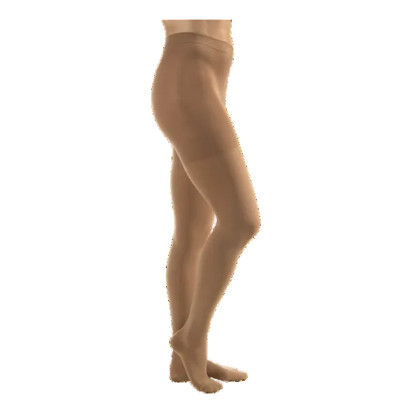 Beige tights worn by a person on a white background