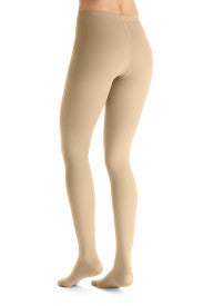 Beige tights worn by a person on a white background