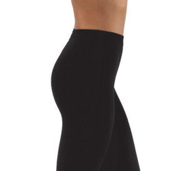 Black leggings worn by a person on a white background
