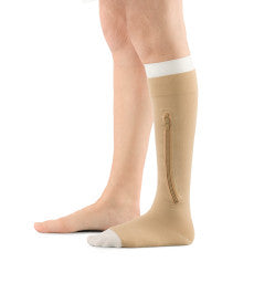 Beige compression socks with zipper from Compressionsale on a white background.