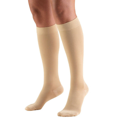 Begie knee-high socks worn by a person on a white background in Trufrom 